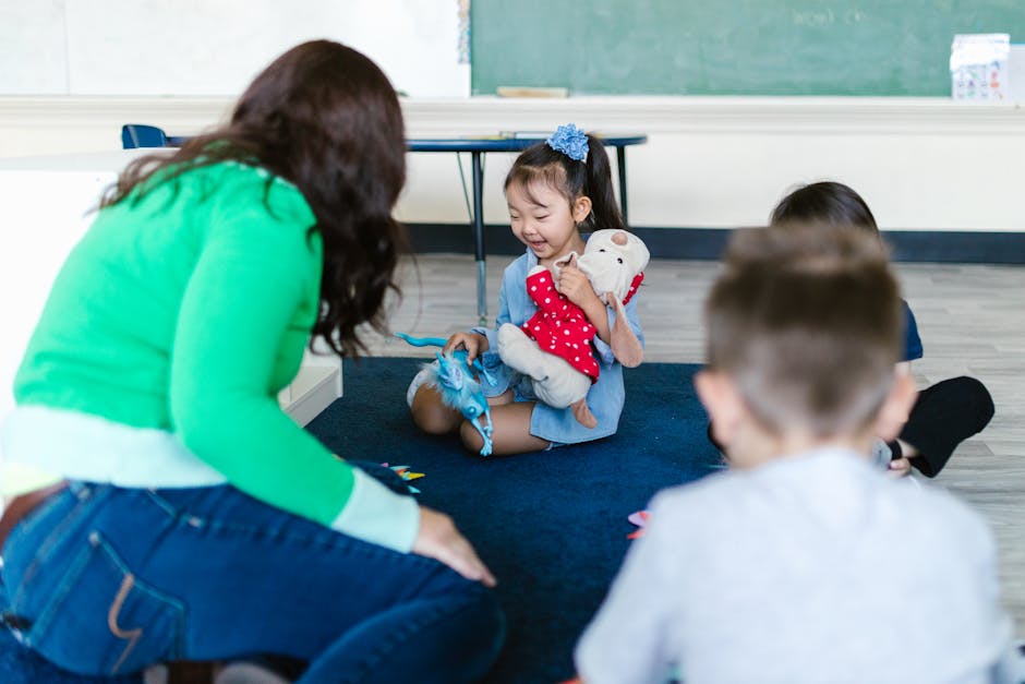 Group of children and a teacher engaged in a fun learning activity inside a classroom